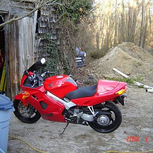 Wolf-VFR near Old barn w/nose of 1952 Dodge PU in Background