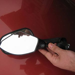 Comparison Photos of stock mirror vs. "carbon fiber look" integra