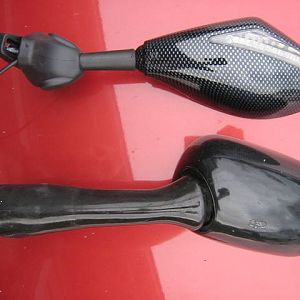 Comparison Photos of stock mirror vs. "carbon fiber look" integra