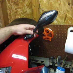 Comparison Photos of stock mirror vs. "carbon fiber look" integra