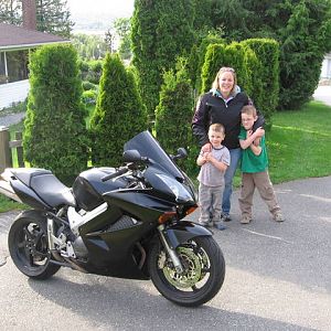 The boys checking out Mum's cool bike