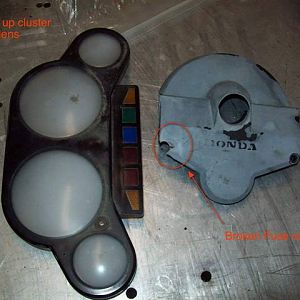 Lens and fuse cover