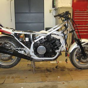 Rear of bike re-assembled, front stripped and cleaned.