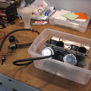Leak testing carb assembly.