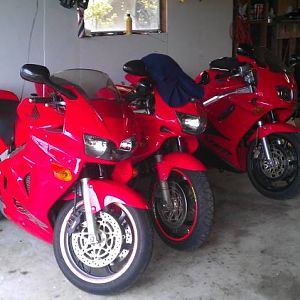 3 red Hondas